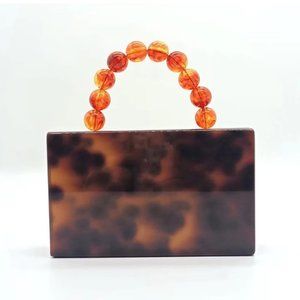 leejune acrylic tortoiseshell clutch